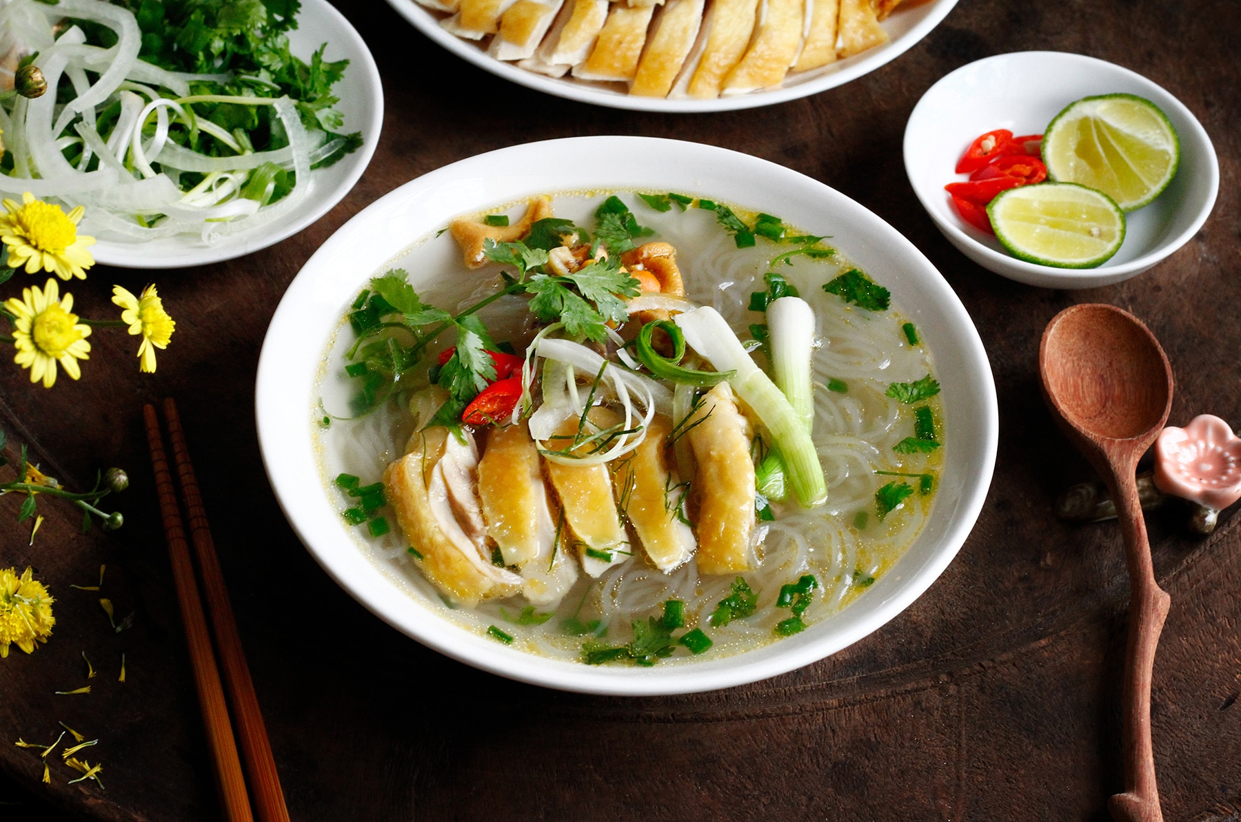 Clear glass noodles with tender chicken pieces in light broth 